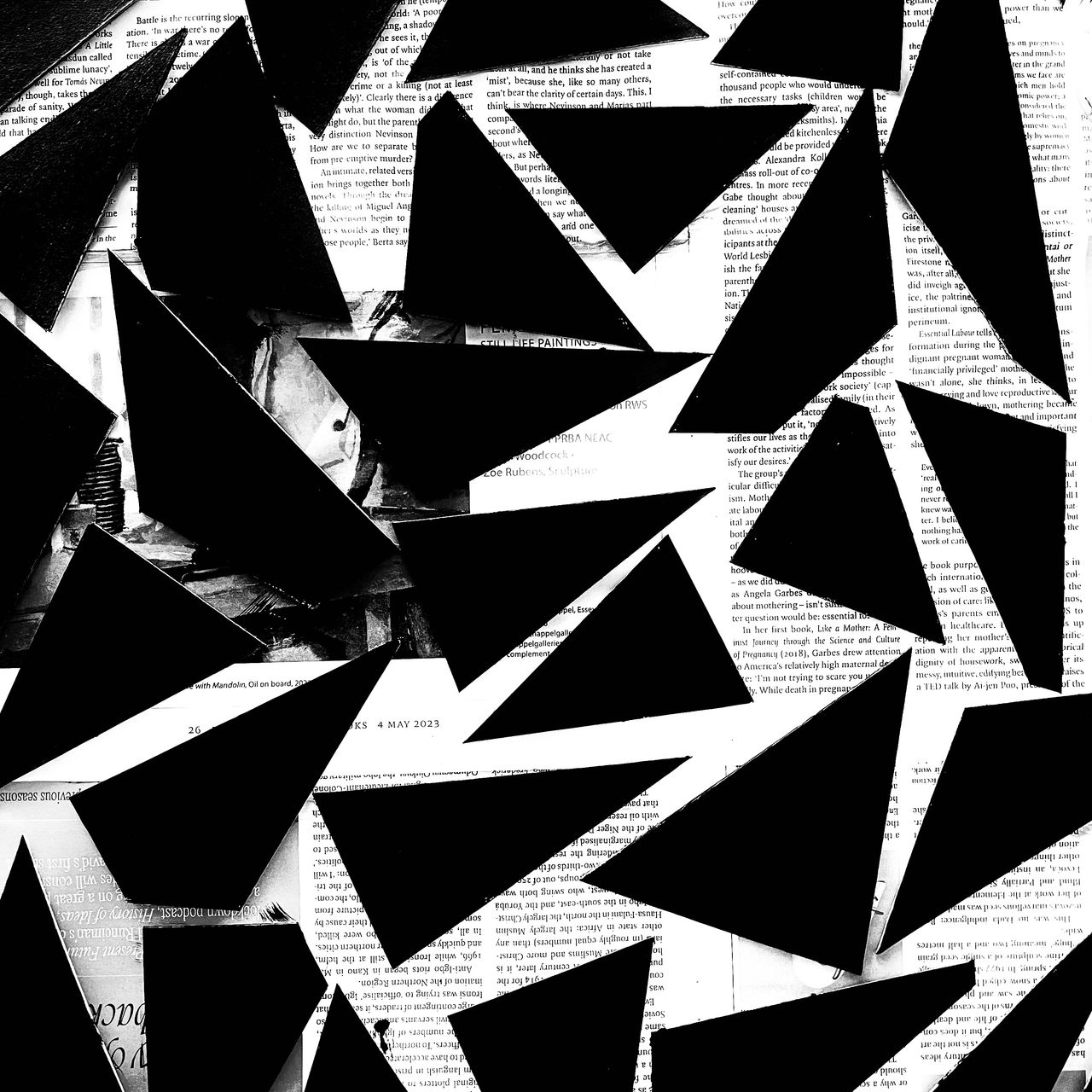Black painted triangles drying on some old issues of LRB, with the contrast slammed.